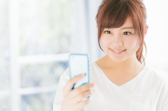 スマホ女性.jpg